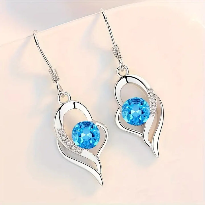 BettyRae - Eclipse Heart Drop Earrings White Gold