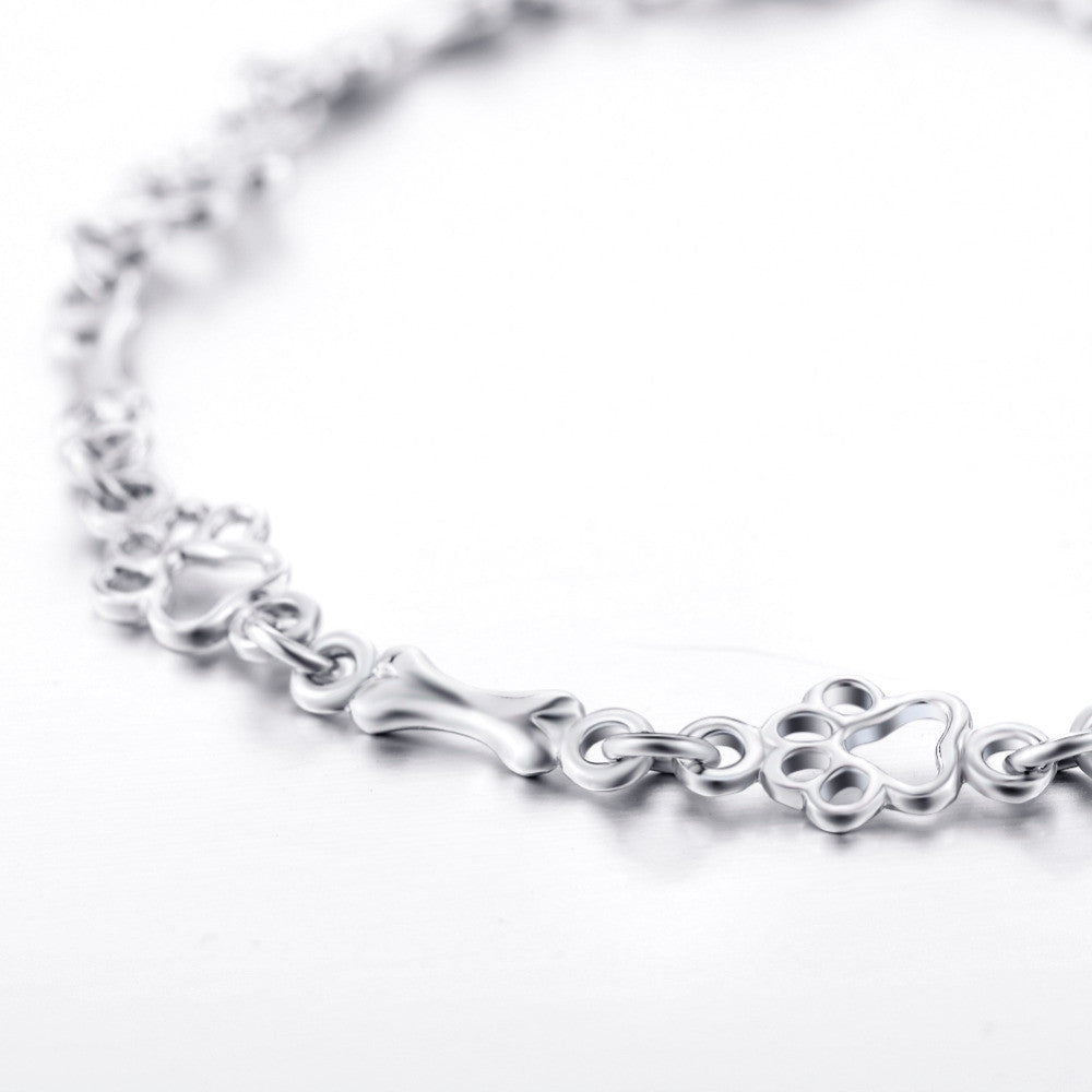 Pure Silver Bracelet Featuring Paw and Bone Charms