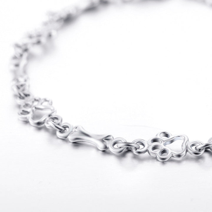 Pure Silver Bracelet Featuring Paw and Bone Charms