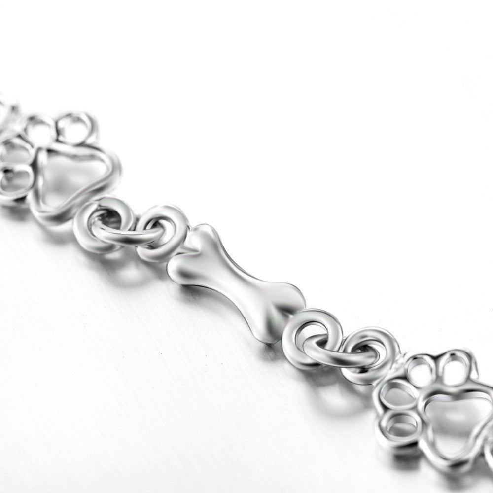 Pure Silver Bracelet Featuring Paw and Bone Charms