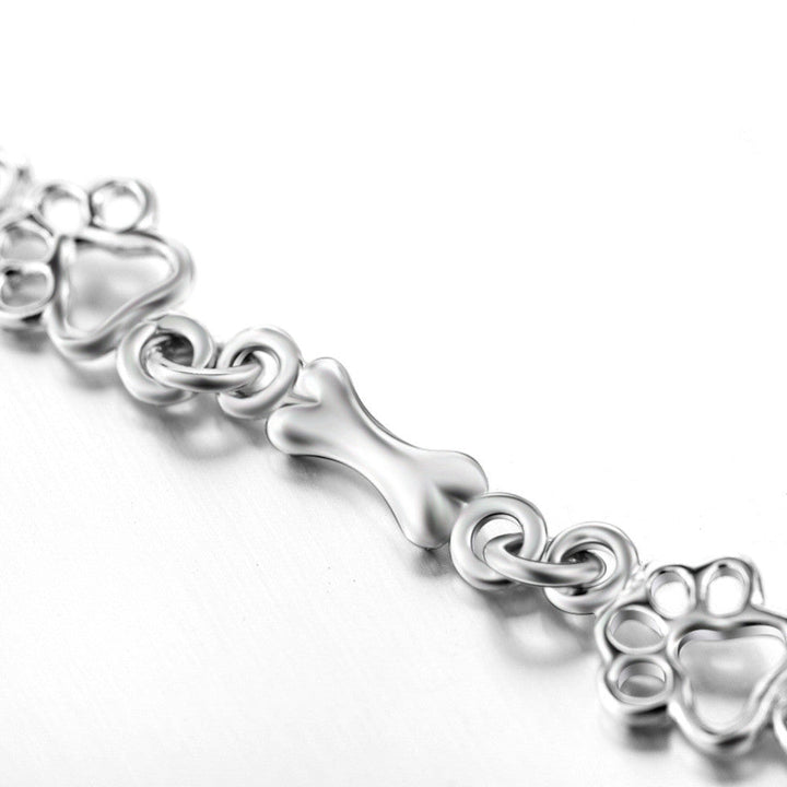 Pure Silver Bracelet Featuring Paw and Bone Charms