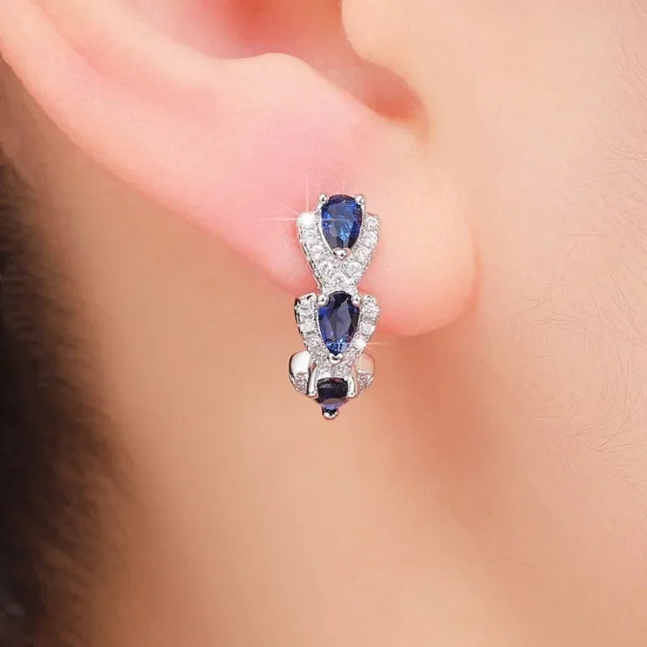BettyRae - Royal Sapphire Crest Earrings White Gold