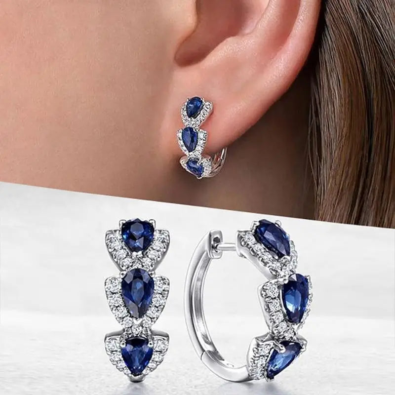 BettyRae - Royal Sapphire Crest Earrings White Gold