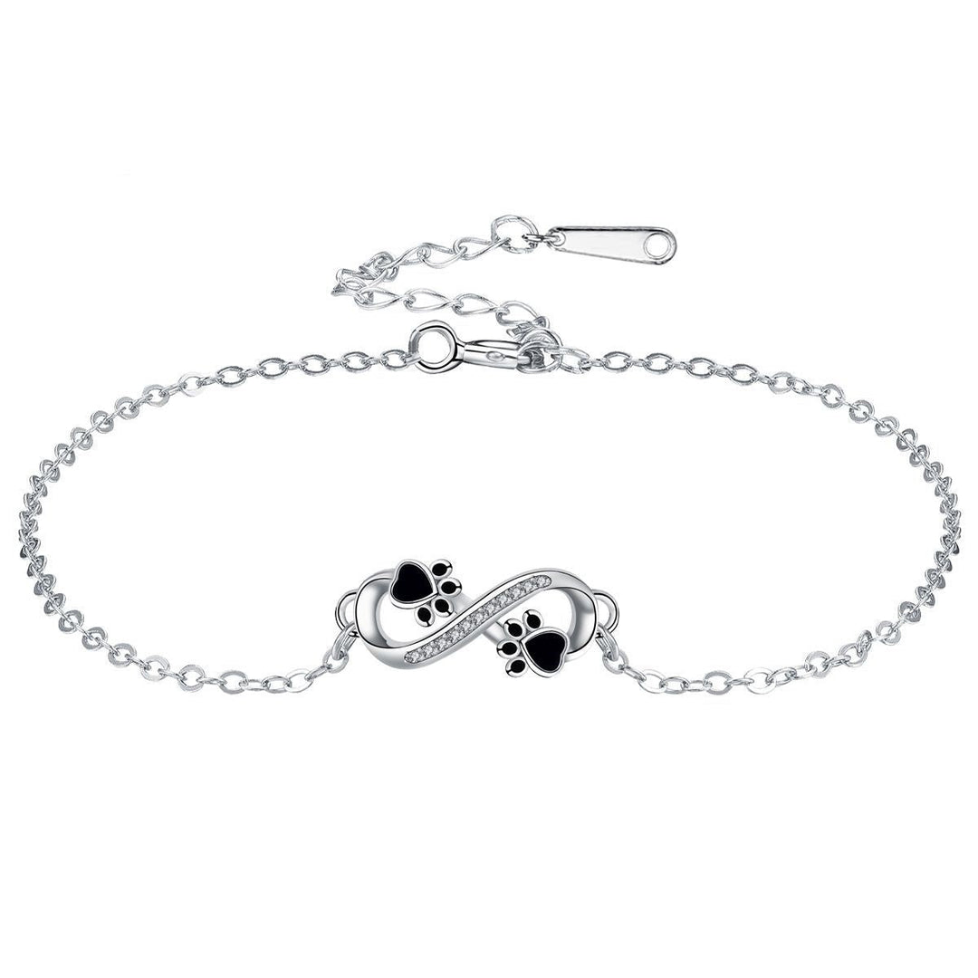 Cubic Zirconia Bracelet Featuring Paw Charm and Infinity Symbol