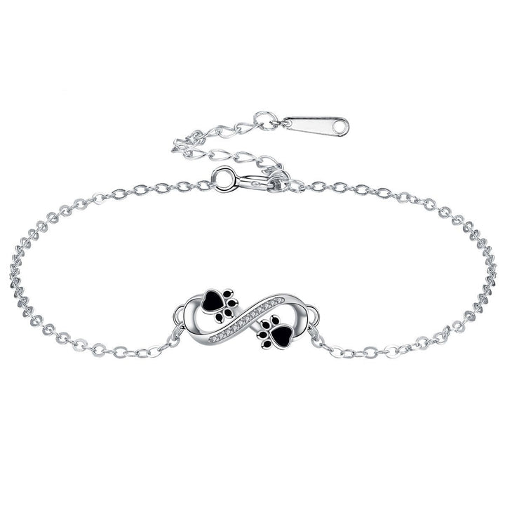 Cubic Zirconia Bracelet Featuring Paw Charm and Infinity Symbol